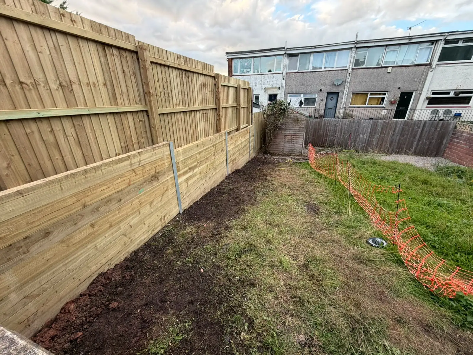 New close-boarded timber fencing along a site boundary