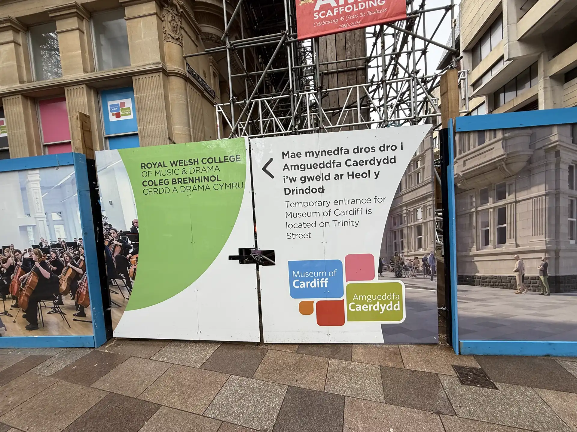 Printed site hoarding and gates with wayfinding graphics on the Hayes, Cardiff