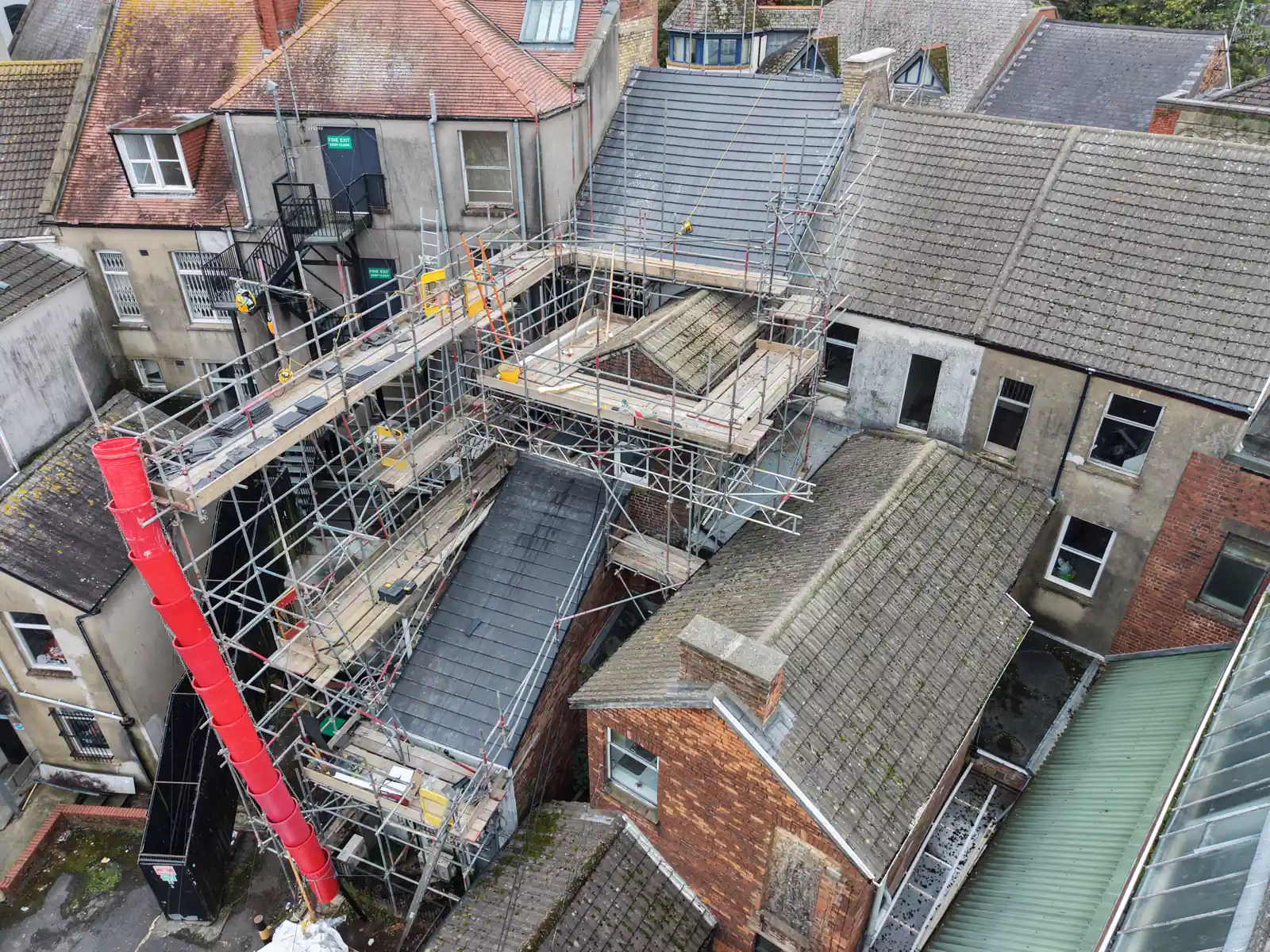 Roof renewal under scaffold at a building-society branch in Llanelli, seen from above
