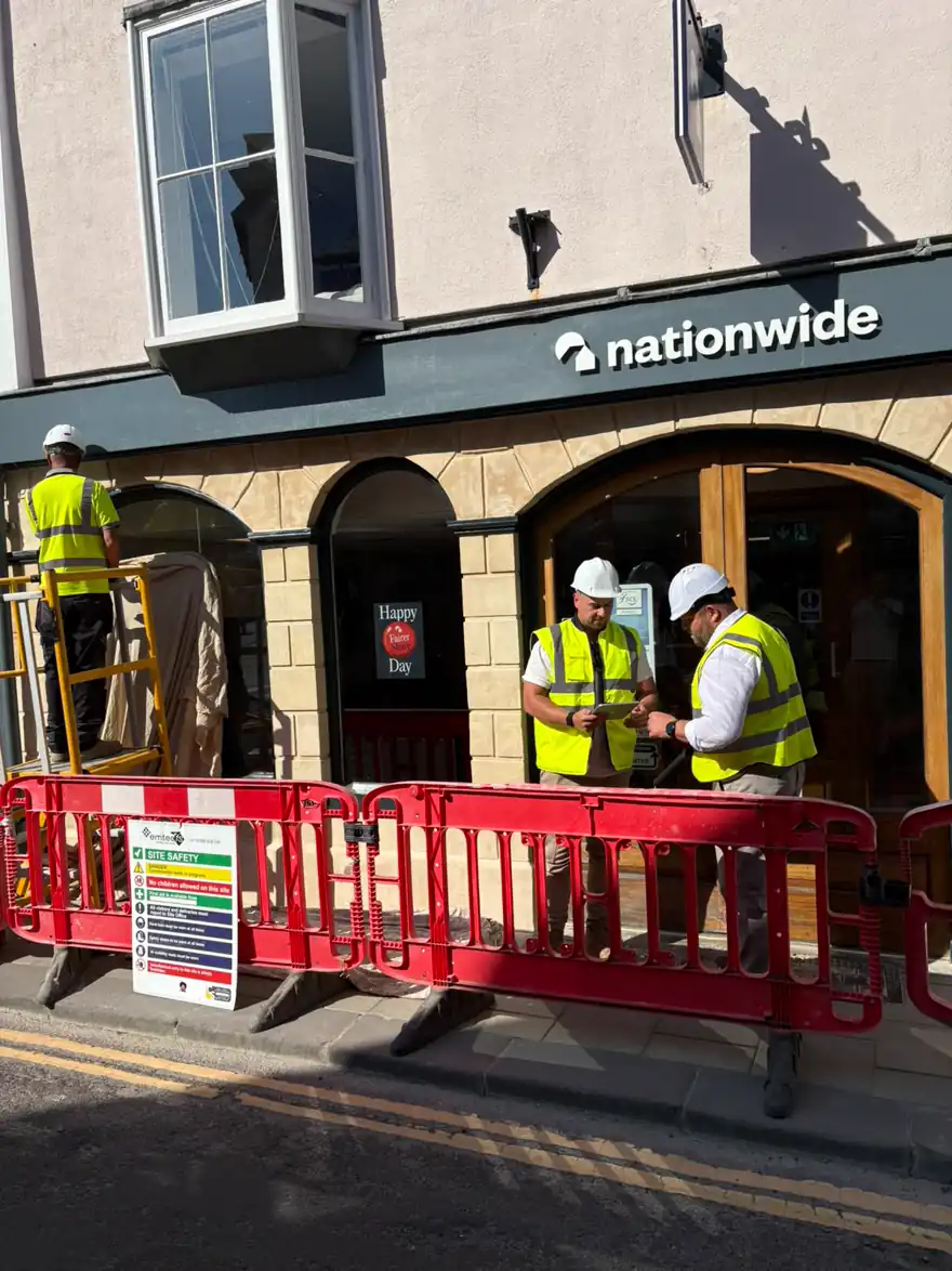 Kingsley operatives outside a Nationwide branch during stone repairs