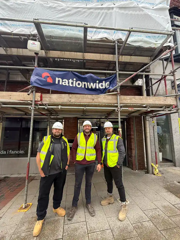 Kingsley team outside a scaffolded Nationwide branch in Llanelli